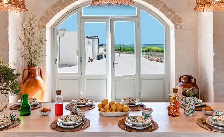 Masseria Salice Salentino — Garden villa dining area